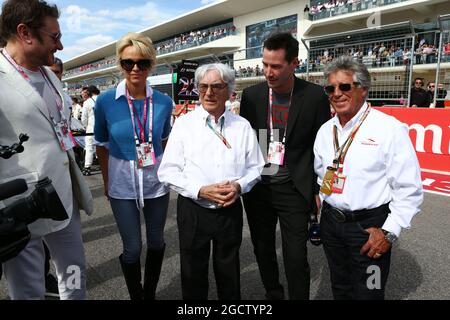 (L to R): Simon Le Bon (GBR) Duran Duran Lead Singer with Pamela Anderson (USA) Actress; Bernie Ecclestone (GBR); Keanu Reeves (USA) Actor; and Mario Andretti (USA) Circuit of The Americas' Official Ambassador. United States Grand Prix, Sunday 2nd November 2014. Circuit of the Americas, Austin, Texas, USA. Stock Photo