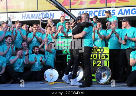 Race winner Lewis Hamilton (GBR) Mercedes AMG F1 celebrates with Thomas Weber (GER) Member of the Board of Management of Daimler AG and the team. Australian Grand Prix, Sunday 15th March 2015. Albert Park, Melbourne, Australia. Stock Photo