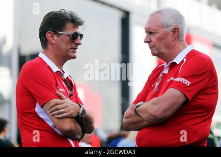 (L to R): Graeme Lowdon (GBR) Manor Marussia F1 Team Chief Executive Officer with John Booth (GBR) Manor Marussia F1 Team Team Principal. Italian Grand Prix, Friday 4th September 2015. Monza Italy. Stock Photo