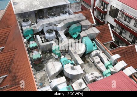 HVAC systems rooftop - industrial air conditioning in an office building in Manila, Philippines. Stock Photo