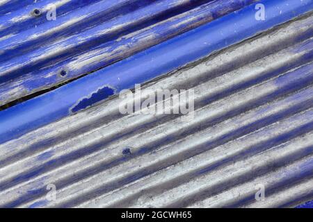 Grungy metal texture. Distressed corrugated metal background. Industrial background. Stock Photo