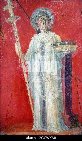 Ceres The goddess is holding the torch and a basket of wheat spikes fresco Pompeii, Casa dei Dioscuri (House of the Dioscuri) 62-79 AD Stock Photo