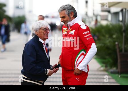 (L to R): Bernie Ecclestone (GBR) with Maurizio Arrivabene (ITA) Ferrari Team Principal. Stock Photo