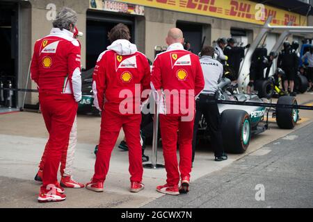 The Ferrari team take a look at the Mercedes AMG F1 W07 Hybrid. Canadian Grand Prix, Thursday 9th June 2016. Montreal, Canada. Stock Photo