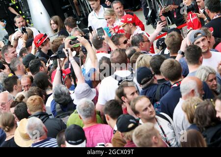 Sebastian Vettel (GER) Ferrari with fans. British Grand Prix, Thursday 7th July 2016. Silverstone, England. Stock Photo