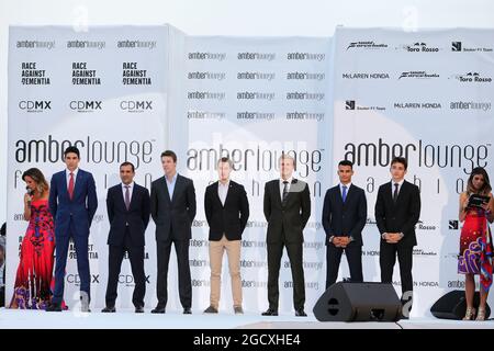 (L to R): Natalie Pinkham (GBR) Sky Sports Presenter; Esteban Ocon (FRA) Sahara Force India F1 Team; Marc Gene (ESP) Ferrari Test Driver; Daniil Kvyat (RUS) Scuderia Toro Rosso; Stoffel Vandoorne (BEL) McLaren; Marcus Ericsson (SWE) Sauber F1 Team; Pascal Wehrlein (GER) Sauber F1 Team; Charles Leclerc (MON) Ferrari Development Driver; and Federica Masolin (ITA) Sky F1 Italia Presenter, at the Amber Lounge Fashion Show. Monaco Grand Prix, Friday 26th May 2017. Monte Carlo, Monaco. Stock Photo