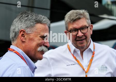 (L to R): Chase Carey (USA) Formula One Group Chairman with Ross Brawn (GBR) Managing Director, Motor Sports. Austrian Grand Prix, Saturday 8th July 2017. Spielberg, Austria. Stock Photo