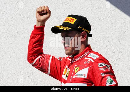 Race winner Sebastian Vettel (GER) Ferrari celebrates on the podium. Hungarian Grand Prix, Sunday 30th July 2017. Budapest, Hungary. Stock Photo