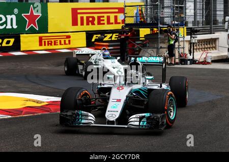 Nico Rosberg (GER) Mercedes AMG F1 W07 leads father Keke Rosberg (FIN) Williams FW08. Monaco Grand Prix, Thursday 24th May 2018. Monte Carlo, Monaco. Stock Photo