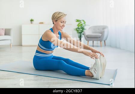 185 Happy Woman Stretching Feet Mat Stock Photos - Free & Royalty