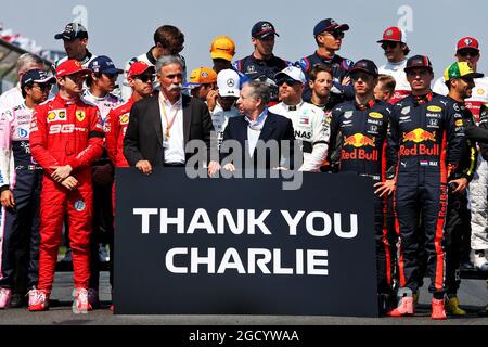 Chase Carey (USA) Formula One Group Chairman; Jean Todt (FRA) FIA President; and drivers pay tribute to Charlie Whiting. Australian Grand Prix, Sunday 17th March 2019. Albert Park, Melbourne, Australia. Stock Photo