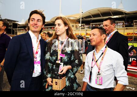 Princess Beatrice (GBR) (Centre) with Edoardo Mapelli Mozzi (Left) and Frankie Dettori (ITA) Jockey (Right). Bahrain Grand Prix, Sunday 31st March 2019. Sakhir, Bahrain. Stock Photo