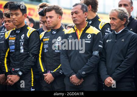 F1, F2, and F3 pay their respects to Anthoine Hubert (L to R): Ye Yifei (CHN) Renault Sport Academy Driver; Max Fewtrell (GBR) Renault Sport Academy Driver; Mia Sharizman (MAL) Renault Sport Academy Director; Alain Prost (FRA) Renault F1 Team Special Advisor. Belgian Grand Prix, Sunday 1st September 2019. Spa-Francorchamps, Belgium. Stock Photo