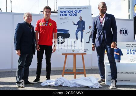 (L to R): Jean Todt (FRA) FIA President with Charles Leclerc (MON) Ferrari and Didier Drogba (CIV) Former Football Player, at an FIA Road Safety Campaign. Italian Grand Prix, Saturday 7th September 2019. Monza Italy. Stock Photo