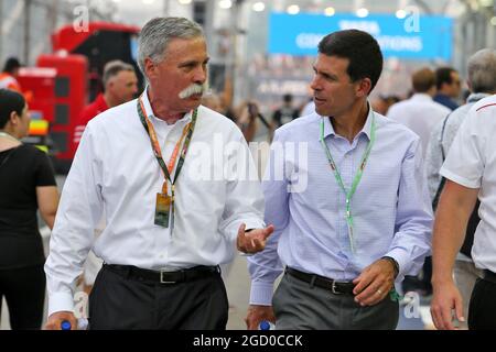 (L to R): Chase Carey (USA) Formula One Group Chairman with John Waldron (USA) President and COO of Goldman Sachs. Singapore Grand Prix, Sunday 22nd September 2019. Marina Bay Street Circuit, Singapore. Stock Photo