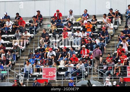 Circuit atmosphere - fans in the grandstand. Japanese Grand Prix, Friday 11th October 2019. Suzuka, Japan. Stock Photo