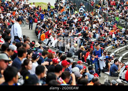 Circuit atmosphere - fans in the grandstand. Japanese Grand Prix, Friday 11th October 2019. Suzuka, Japan. Stock Photo