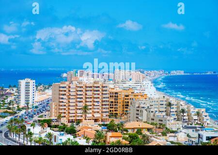 a panoramic view over La Manga del Mar Menor, in Murcia, Spain, with the Mar Menor lagoon on the left and the Mediterranean sea on the right Stock Photo