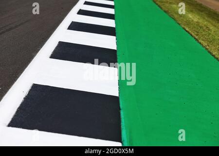 Circuit atmosphere - kerb detail. British Grand Prix, Thursday 30th July 2020. Silverstone, England. Stock Photo