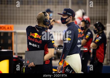 Max Verstappen (NLD) Red Bull Racing with Gianpiero Lambiase (ITA) Red Bull Racing Engineer in the pits while the race is stopped. Bahrain Grand Prix, Sunday 29th November 2020. Sakhir, Bahrain. Stock Photo