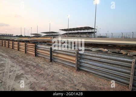 The armco barrier between turns 4 and 5 has two layers of tyres with a conveyor-belt binding installed after the crash of Romain Grosjean (FRA) Haas F1 Team in the Bahrain Grand Prix. Sakhir Grand Prix, Thursday 3rd December 2020. Sakhir, Bahrain. Stock Photo