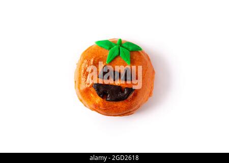 Halloween pumpking donut isolated on white background Stock Photo