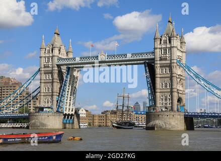 London, UK, August 10th 2021. After being stuck open with a fault for 12 hours the previous day, Tower Bridge safely opened and closed as the Pelican of London, a tall, Square Rigger ship sailed through. The ship was in London to collect her next crew of young trainees as part of a charity project. Monica Wells/Alamy Live News Stock Photo