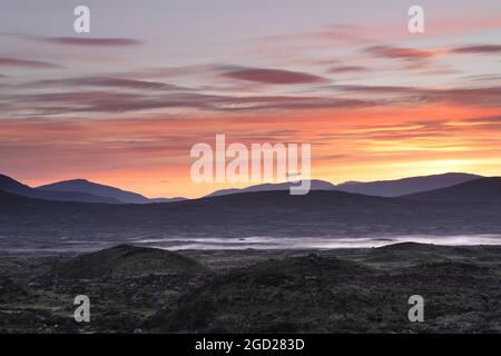 Colourful Dawn Light and Mist on Rannoch Moor, Scotland, UK Stock Photo