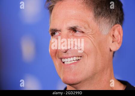 Ljubljana, Slovenia. 10th Aug, 2021. Mavericks owner Mark Cuban seen smiling at a press conference after Luka Doncic's signing of a 5-year extension contract with Maverics.Slovenian NBA star Luka Doncic signed a five-year 207-million-dollar contract extension with the Dallas Mavericks on Tuesday after Mavericks owner Mark Cuban, head coach Jason Kidd, general manager Nico Harrison and advisor Dirk Nowitzki arrived in Slovenia to formalize the deal. Credit: SOPA Images Limited/Alamy Live News Stock Photo