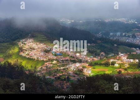 View of Ooty town from Doddabetta View Point, India. Doddabetta is the highest peak in the Nilgiri Mountains at 2,637 metres (8,652 feet) Stock Photo