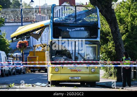 A DOUBLE DECKER BUS HAD ITS ROOF RIPPED COMPLETELY OFF AFTER IT ...