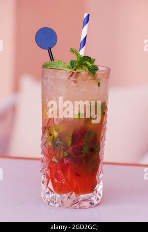 cocktail drink passion fruit mojito, vodka, mint and lemon based alcoholic drink Stock Photo