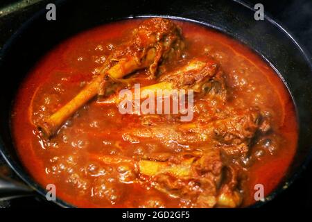 slow cooked indian lamb shank curry, also known as nalli rogan josh Stock Photo