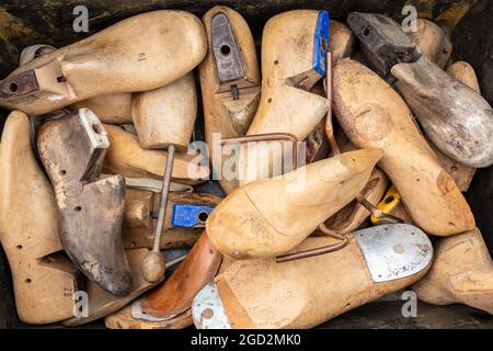 Vintage Antique Wooden Cobbler's Shoe Lasts and Stretchers. Shoe repair concept. Stock Photo
