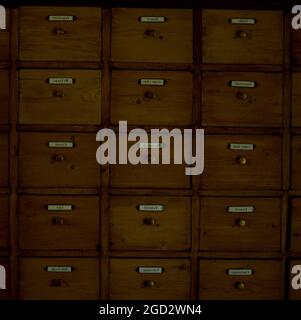 Wooden drawers with labels Stock Photo by ©Amvorsuf 111773580