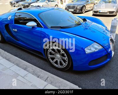 Monte-Carlo, Monaco - August 1, 2021: Blue Bugatti Veyron 16.4 Luxury Supercar Parked In Front Of The Monte-Carlo Casino In Monaco On The French Rivie Stock Photo