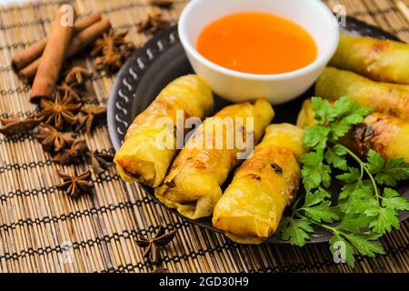 Spring rolls with sweet sauce, top view Stock Photo - Alamy
