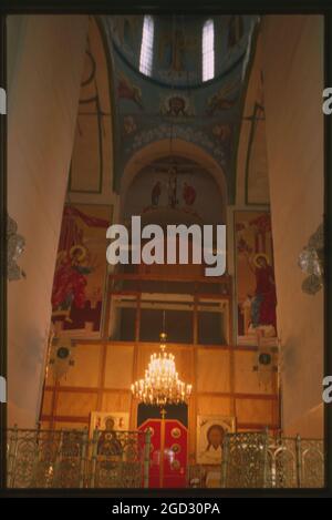 Cathedral of St. Sophia and Dormition (1681-86), interior, view east toward icon screen being repainted after devastation of Soviet era, Tobol'sk, Russia 1999. Stock Photo