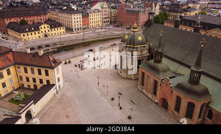 A drone shot of the Gamla Stan and Riddarholmskyrkan church in the old center of Stockholm, Sweden Stock Photo