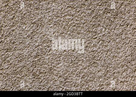 Closeup shot of a dark beige textured wall Stock Photo