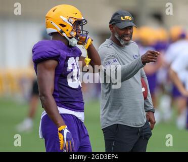 August 10, 2021: LSU Defensive Back Coach Corey Raymond talks with Lloyd Cole (33) during the first week of fall football camp at the LSU Charles McClendon Practice Facility in Baton Rouge, LA. Jonathan Mailhes/CSM Stock Photo