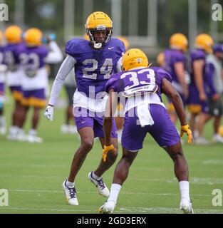 August 10, 2021: LSU defensive backs Darren Evans (24) and Lloyd Cole (33) run drills during the first week of fall football camp at the LSU Charles McClendon Practice Facility in Baton Rouge, LA. Jonathan Mailhes/CSM Stock Photo