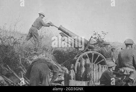 American 155 mm artillery cooperating with the 29th Div. in position on road just taken from the Germans. Bat[tery] A 324th artillery, 158[th] Brig[ade] in France / Signal Corps ca.  1917 Stock Photo
