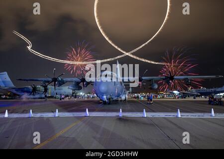 Oshkosh, WI - 27 July 2021: An AC-130J ghostrider gunship from AFSOC at EAA in Oshkosh with fireworks Stock Photo