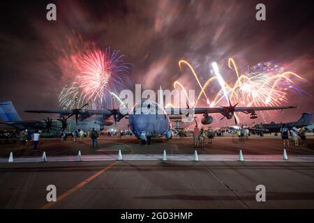 Oshkosh, WI - 27 July 2021: An AC-130J ghostrider gunship from AFSOC at EAA in Oshkosh with fireworks Stock Photo
