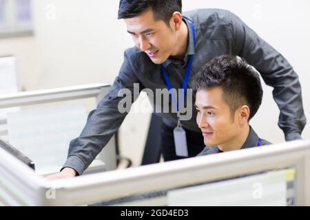 Computer programmers at work Stock Photo