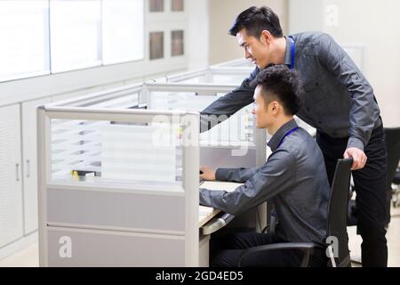 Computer programmers at work Stock Photo