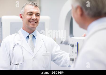 Doctors with MRI scanner Stock Photo