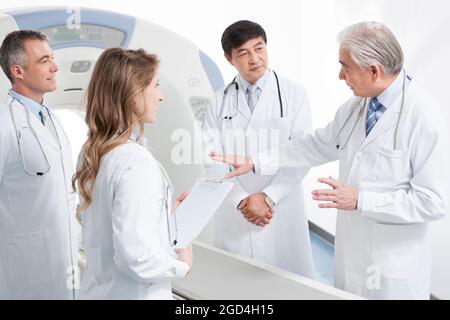 Doctors in CT room Stock Photo