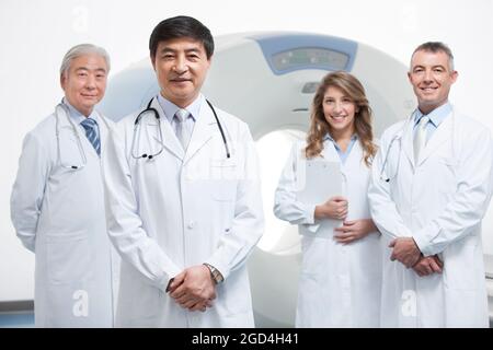 Doctors in CT room Stock Photo